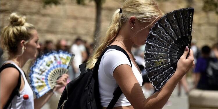 Donne al limite tra caldo e carico mentale