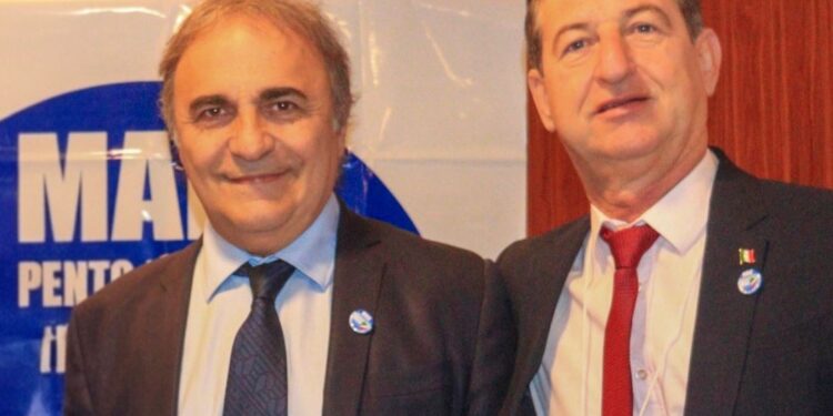 Daniel Pavarin con Ricardo Merlo, presidente MAIE